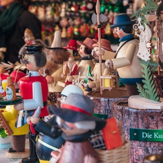 close up of wooden figurines at a vendor booth at the Peoples Gas Holiday Market in Pittsburgh